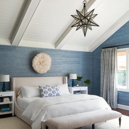 Serene master bedroom in classic Hampton's weekend home