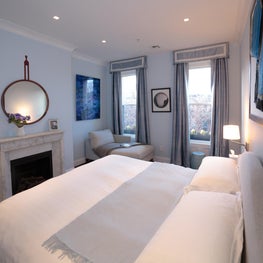 The Modern Collectors' Home- Bedroom with Chesney Fireplace 