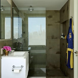 Modern bathroom with stone tile shower