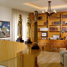 Palm Beach library and home office featuring anigre wood accents 