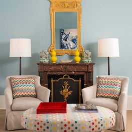 An antique mantle with gorgeous gold DeGournay mirror in our vignette