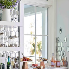 Mirror backsplash in the kitchen