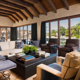 Love the window walls in this poolside party cabana retreat!
