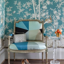 Colorful corner with custom upholstery on French antique settee