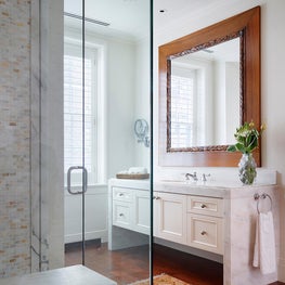 Ann Sacks tile with a custom vanity & shower bench using Calacatta marble 
