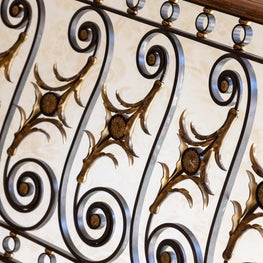 Patinated bronze and gilt railing details