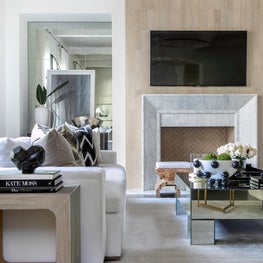 Portfolio: A modern family room with custom sofas, Maya Romanoff wood veneer.