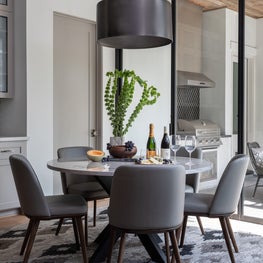 Portfolio: Modern breakfast table with chic grey chairs and pendant