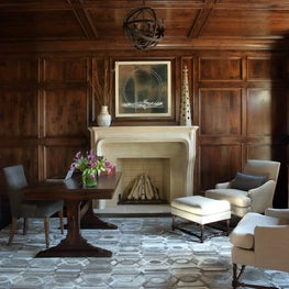 Buckhead Residence Study with wood panelling and fireplace