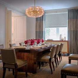 Stunning Dining Room, Starburst Chandelier, Macassar ebony vintage table.