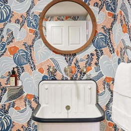Bohemian Chic Powder Room with Foliage Wallpaper