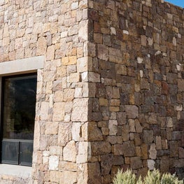 Exterior stone wall corner detail, Estancia del Rio, Arizona