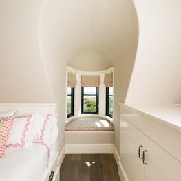 Bunk Room Curved Bay Window Seat and Dormer with Built-in Cabinets