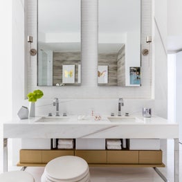 Dolomite marble countertops for a calm and relaxing space.