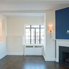 Custom Fireplace with Blue Accent Wall - Open Living Room 