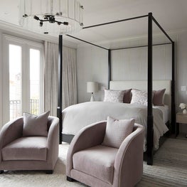 16th Ave Master Bedroom with four poster bed, modern seating, calming palette