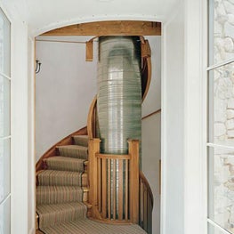 Wisconsin Lake Home with Farmhouse Style: Silo Stairwell