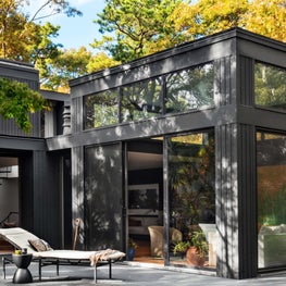 East Hampton Modern home, sleek rear facade with large windows