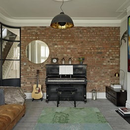 Living room, Muswell Hill, London, with statement wall