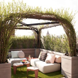 Outdoor Pergola Living Area  - Downtown Triplex 