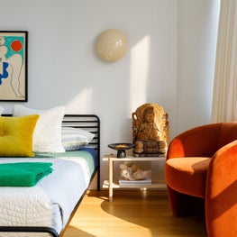 Mies : Rust Chair, Vintage Rug, Metal Bed, Sconce, Art, Wood Side Table