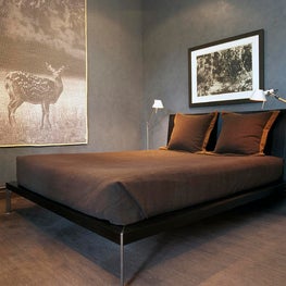 Venetian plastered walls painted midnight blue 