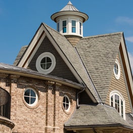 Carriage House with Circular Cupola and Curved Brick Connector