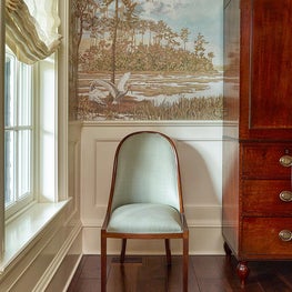 Pretty Charleston Dining Room with Paneled Wainscoting and Wide Walnut Floors