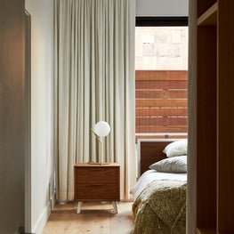 Union Square Penthouse Master Bedroom with Glass Headboard