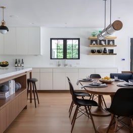 Kitchen with built-in breakfast banquet with a view to the family room