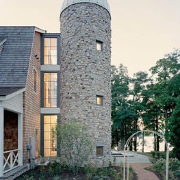 Wisconsin Lake Home with Farmhouse Style: Stone Silo Stairwell