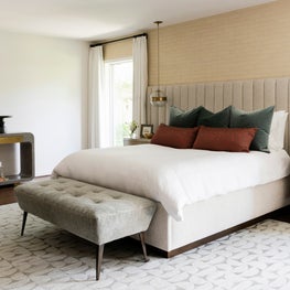 Portfolio: Neutral-toned master bedroom with a bench and grey console