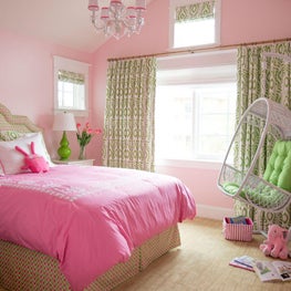 Pink kid's room with swing chair