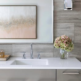 Portfolio: Sophisticated, neutral bathroom with white walls and countertops