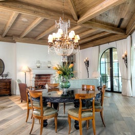Living Room with Stone Fireplace, Walnut Beams and Hope's Steel French Door