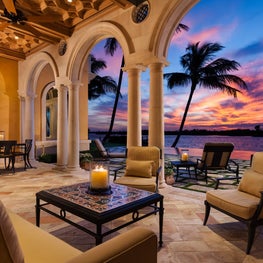 Pecky cypress ceiling, antique terra cotta flooring and carved limestone details