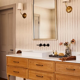 Master Bedroom with Oak Vanity and Vintage Mirror