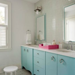 Bathroom with Tile Accent Wall and Turquoise Vanity