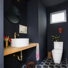 Powder Room in Black with Cement Tile, White Oak and Brass
