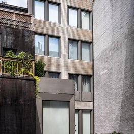Upper East Side Townhouse, Rear facade in custom glazed terra cotta