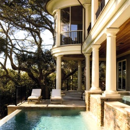 Infinity Edge Pool and Spa under Screened Porch and Loggia
