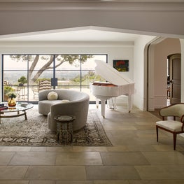 Living room with a view and french limestone floors.
