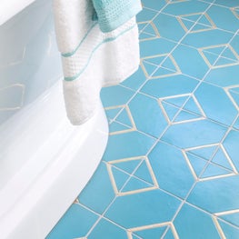 Tuquoise tile with bronze inlay. Sophia Shibles Interiors