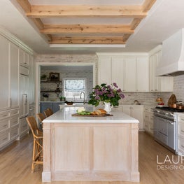 We love how the oak beams create give warmth, texture, and dimension to this provincial countryside kitchen.