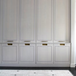 Tribeca Contemporary: Built In Cabinetry with unlacquered brass hardware