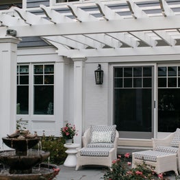 Glenview Patio. Glenview Patio. Blue and white scheme with pergola, natural slate pavers & wicker furniture.