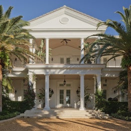 Tropical Georgia entry to an oceanfront Palm Beach Estate