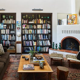 Great room with book shelves in midcentury ranch house