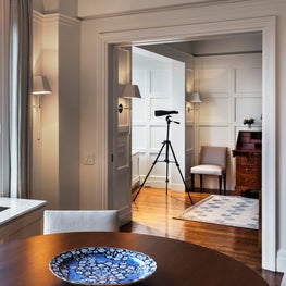 Riverside Drive Apartment, Timeless Hallway with White Paneling, Telescope