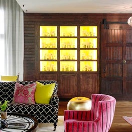 Living & Great Room with Wood Barn Door and Built-In Cabinetry